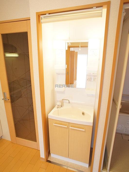 Wash basin, toilet. Bathroom vanity