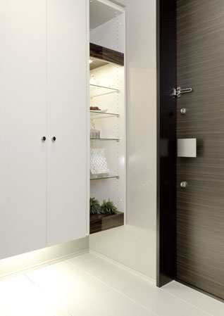 Interior.  [entrance] Entrance, Corridor, toilet, The floor of vanity room and tile finish, Carousel exudes a sense of quality from the feet. Also, At the door housed modern design was charged with indirect lighting at the bottom, It is plenty of storage capacity.