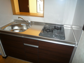 Kitchen. Two-burner stove city gas ・ Popular face-to-face kitchen!