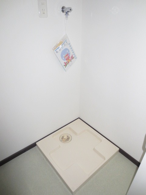 Other Equipment. Washing machine in the room