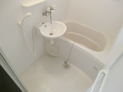 Bath. It is a bathroom with cleanliness.