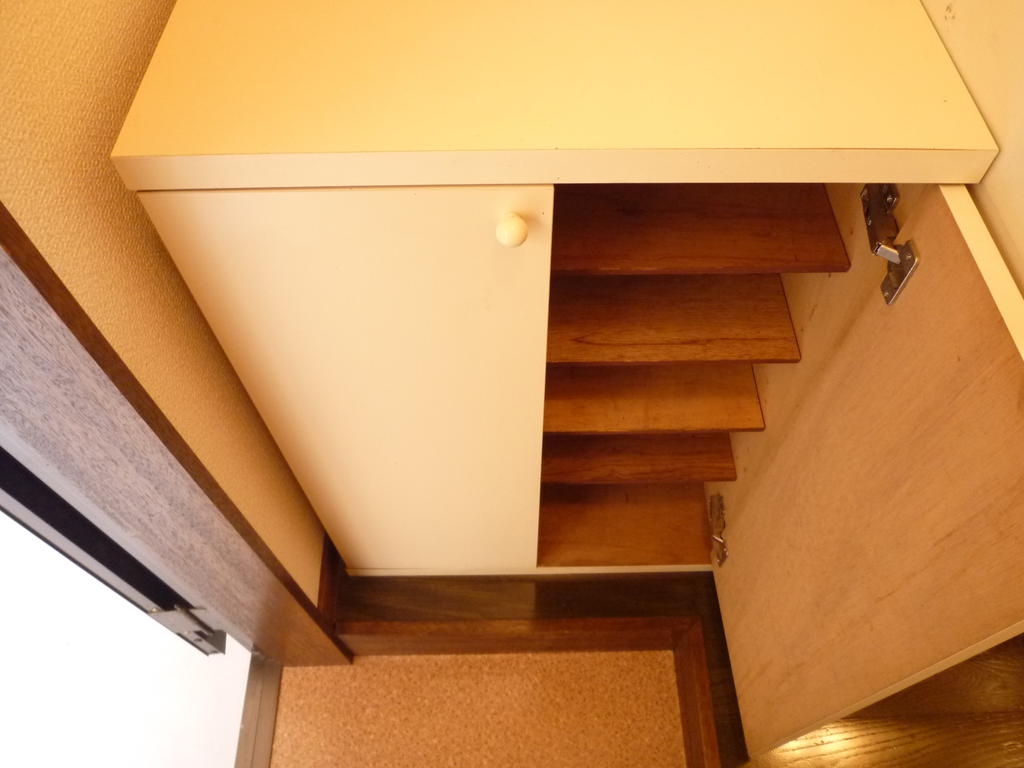 Entrance. It is with cupboard.