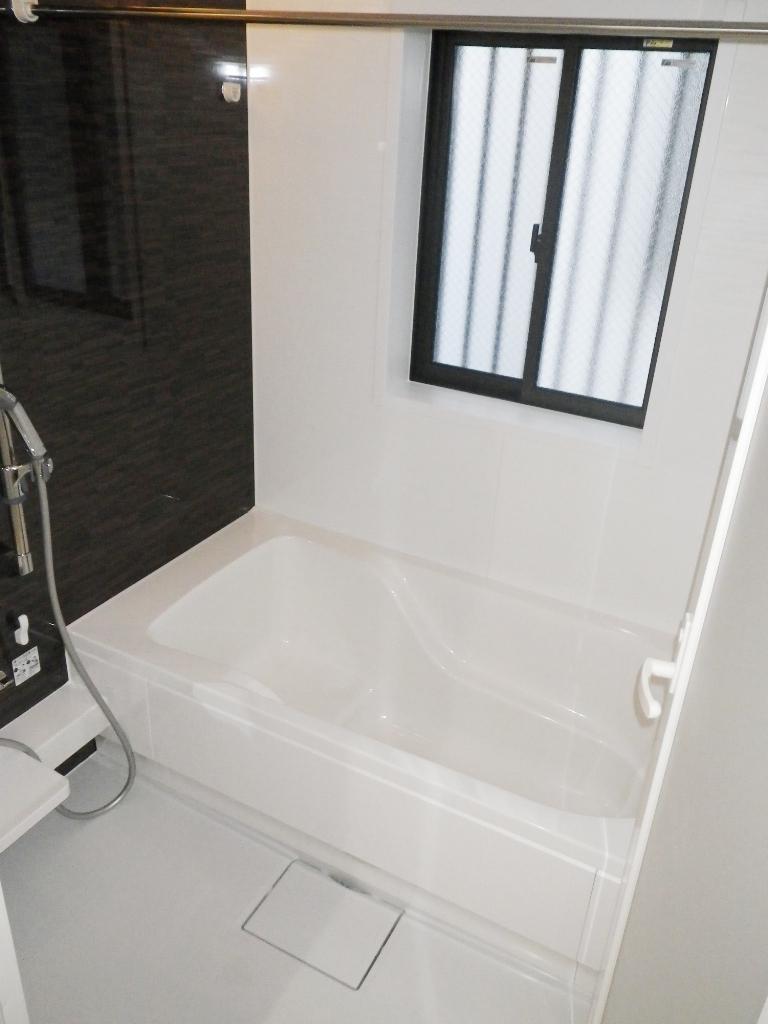 Bathroom. It is a bath with a bathroom ventilation dryer