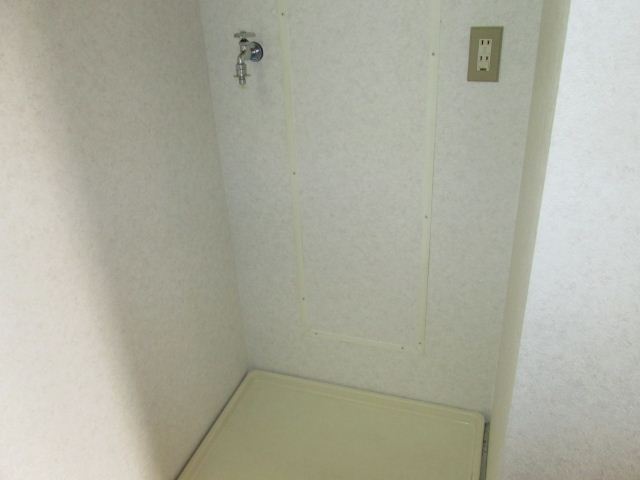 Other Equipment. Washing machine in the room