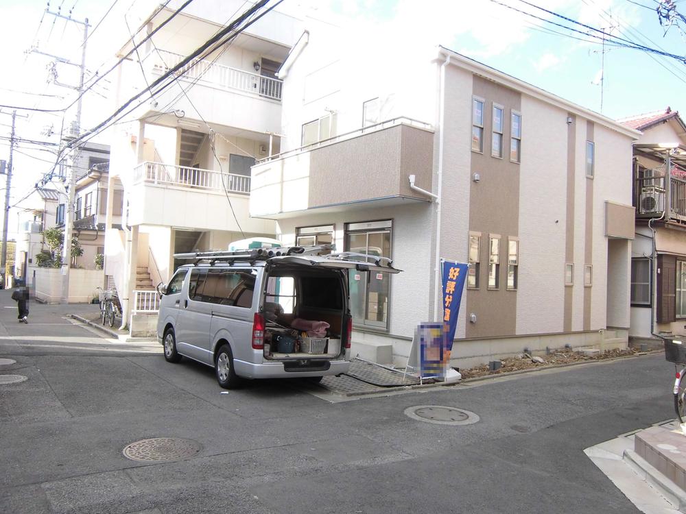 Local photos, including front road. It is a popular corner lot