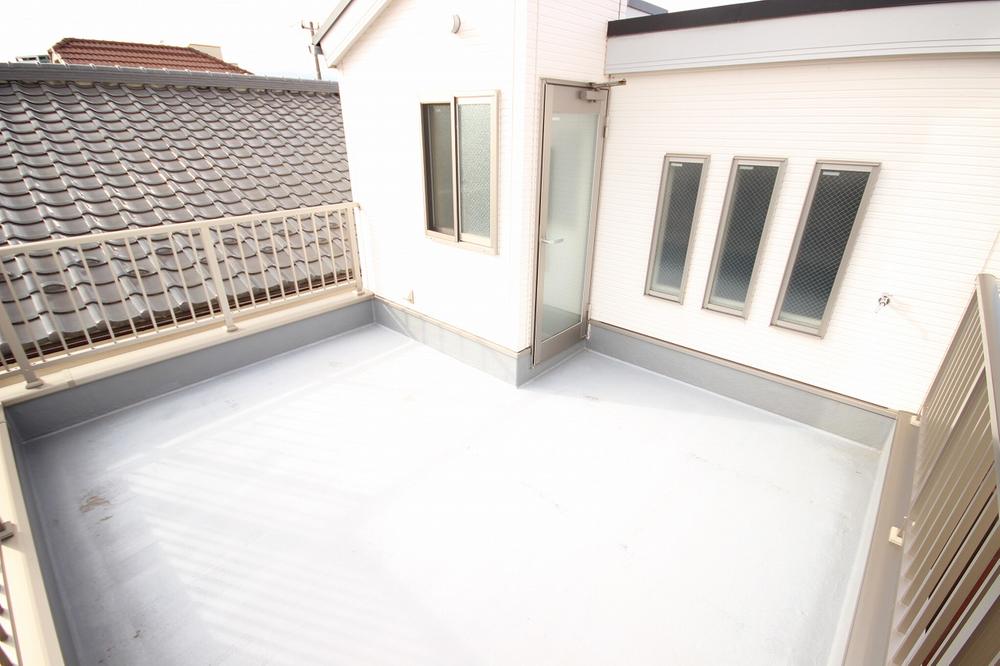 Balcony. A house with a roof balcony