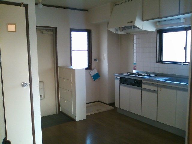 Kitchen. There is also a large window in the kitchen.