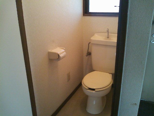 Toilet. There is also a window to the toilet.