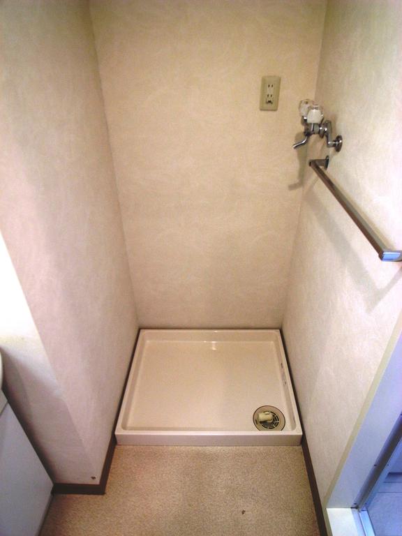 Other Equipment. Washing machine in the room