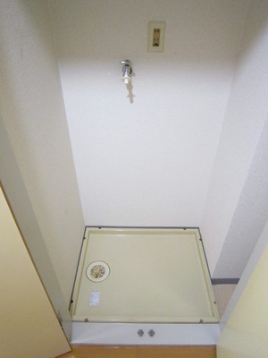 Other Equipment. Washing machine in the room