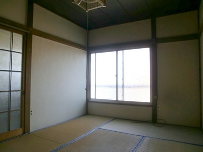 Living and room. There is also a window on the east side.