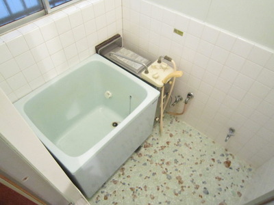 Bath. There is a window in the bathroom