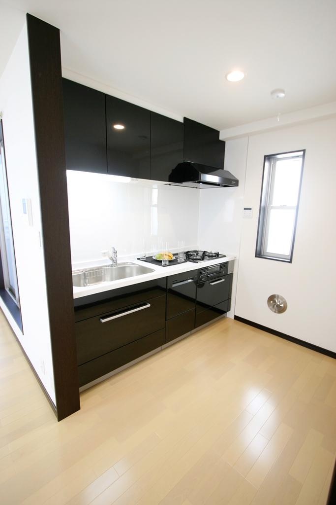 Kitchen.  [Photo D-2 Building]  Washable up to every nook and corner of the sink pull out shower faucet Ally of wife, Dish washing dryer LDK ・ Hot water floor heating in the kitchen floor! East leaf standard specification!