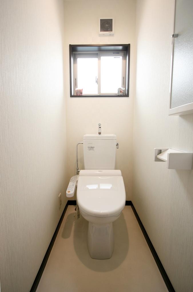 Toilet.  [Photo D-2 Building] Toilet of warm water washing toilet seat.