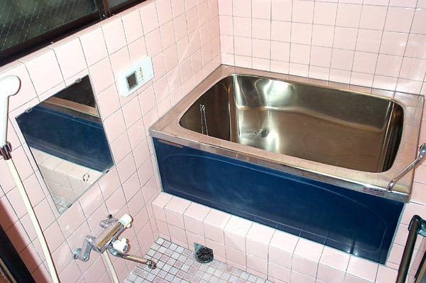 Bath. There is a window. 