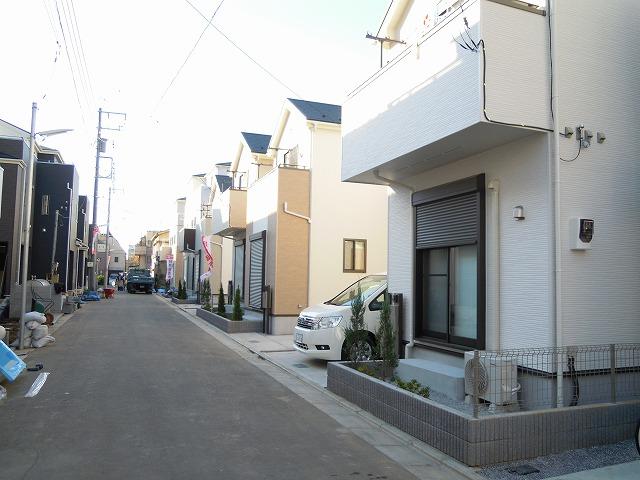 Local photos, including front road. All building nearing completion!