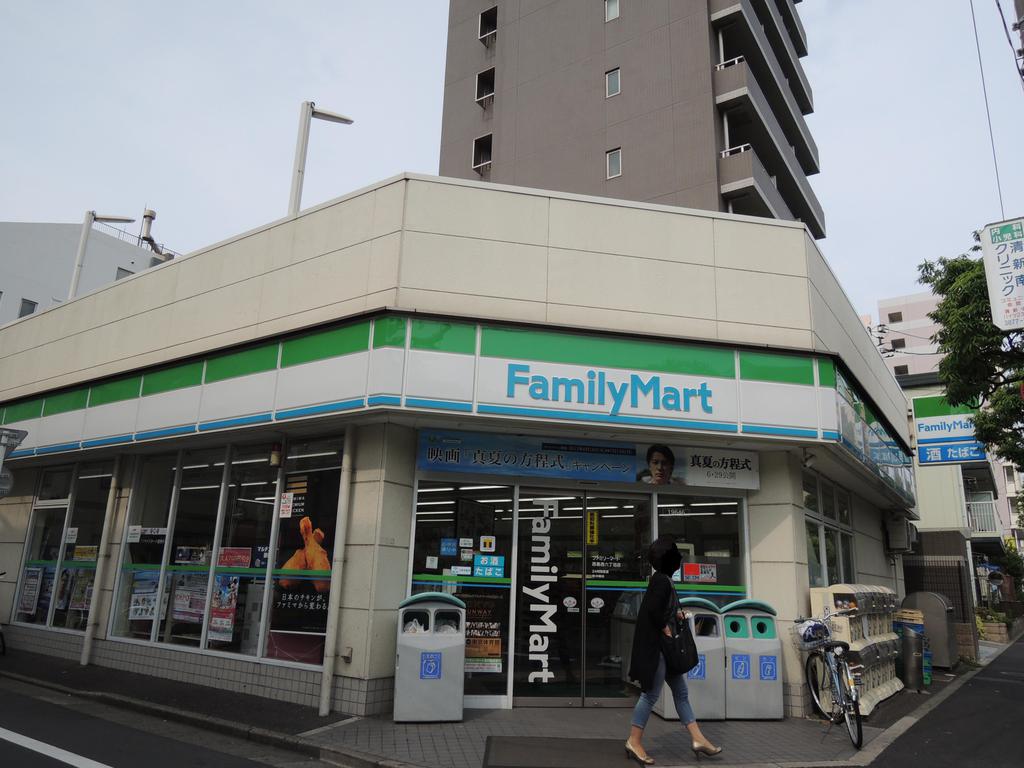 Convenience store. Family Mart Nishi-Kasai Station store up (convenience store) 242m