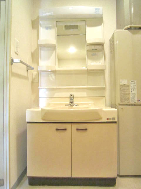 Washroom. It is a photograph of another room of the same type