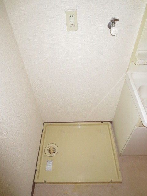 Other Equipment. Washing machine in the room