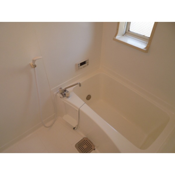 Bath. There is a window in the bathroom