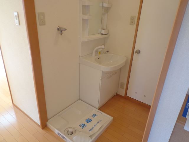 Washroom. Independent wash basin Laundry Area