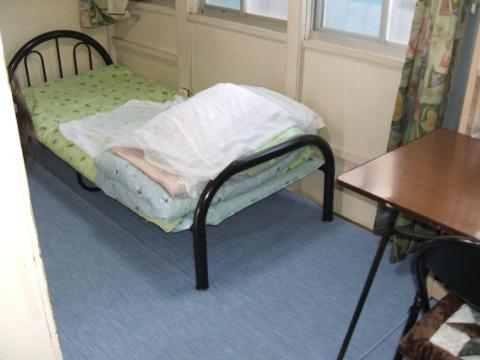 Living and room. It is a simple room. 