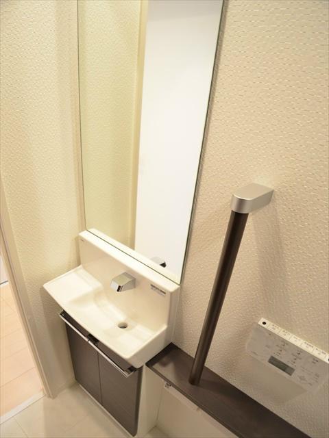 Toilet. This is useful with a hand-wash cabinet