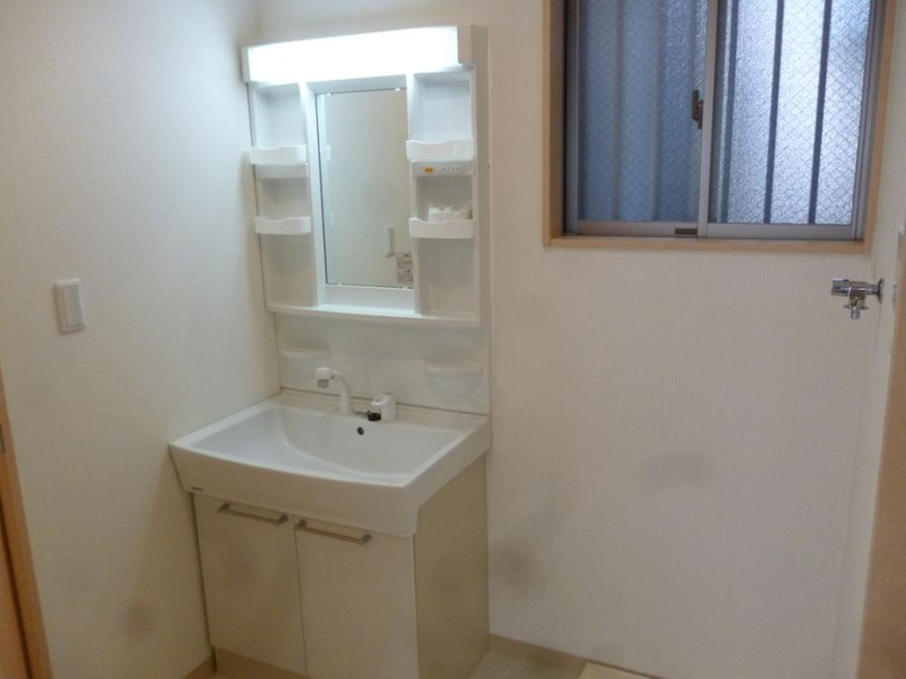 Wash basin, toilet. Bathroom vanity