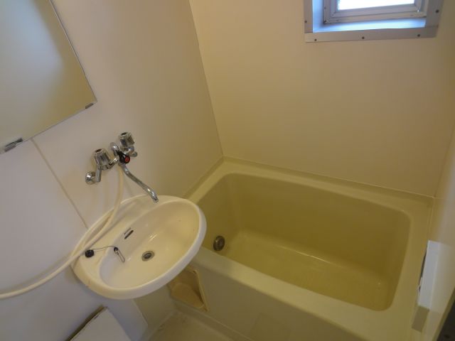 Bath. It is the window with the bath.