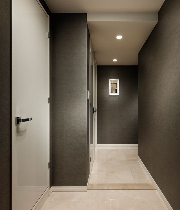 Interior.  [Entrance of natural marble paste] The entrance is the residence of the face, On the floor and stile has been gracefully directing paved with natural stone.