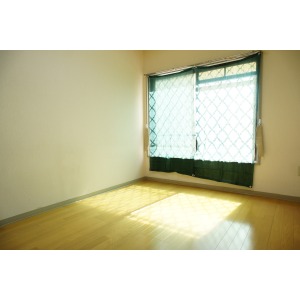 Toilet. There is a small window