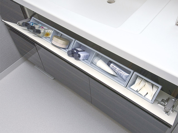 Bathing-wash room.  [Cosmetics pocket] Has adopted a convenient cosmetics pocket for storage of cosmetics and daily accessories frequently used is at hand. (Model Room N1 type)