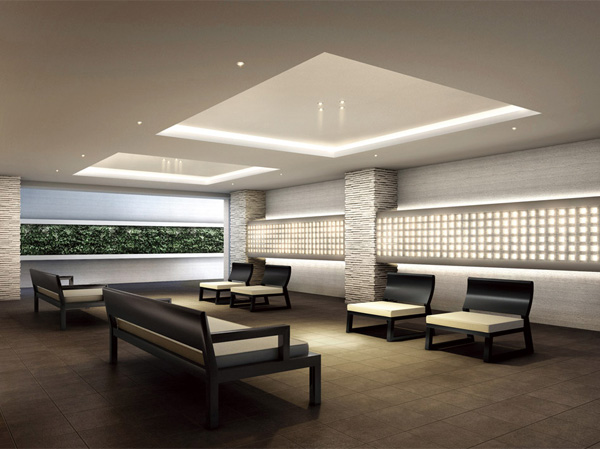 Shared facilities.  [Entrance hall] White-collar and fantastically shining indirect lighting, The design that has been constructed in the green wall to feel the organic peace, Arranged sofa foster socializing, Such as to be spread open feeling and the lighting plan, Delicate consideration have been made. (Rendering)