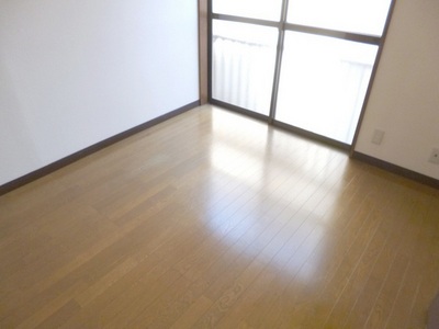 Living and room. Corner is a room in a 3 room sorting type