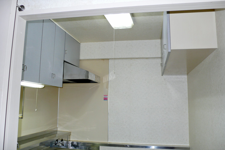 Kitchen. The top hanging storage