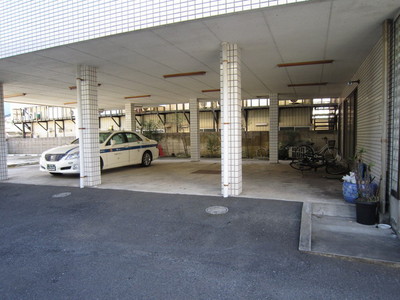 Building appearance. Parking lot