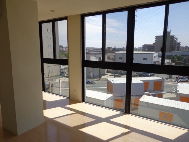 Living and room. It is a large window.