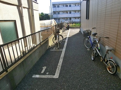 Parking lot. It is a bicycle parking space