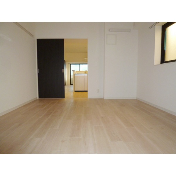 Other room space. It is a photograph of 201, Room