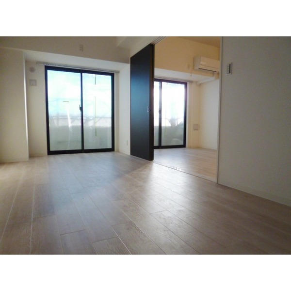 Other room space. It is a photograph of 201, Room