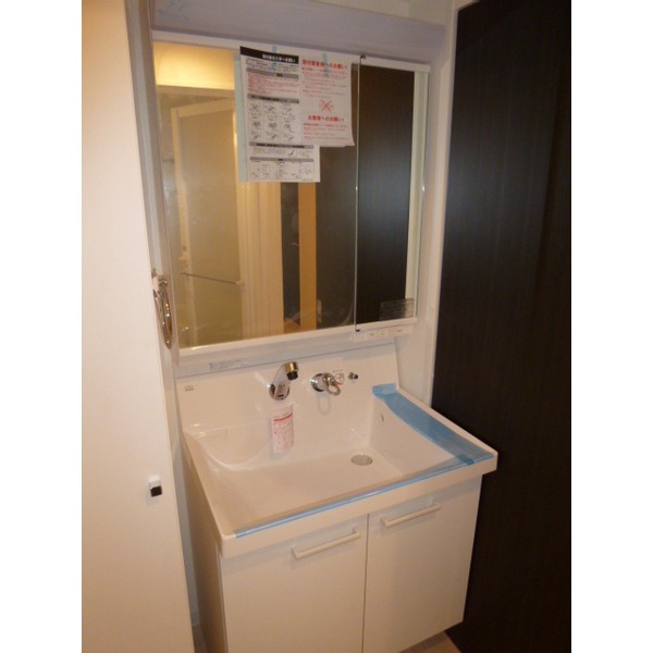 Washroom. It is a photograph of 201, Room