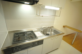 Kitchen. The width of the dishes will spread in the three-necked gas system Kitchen.