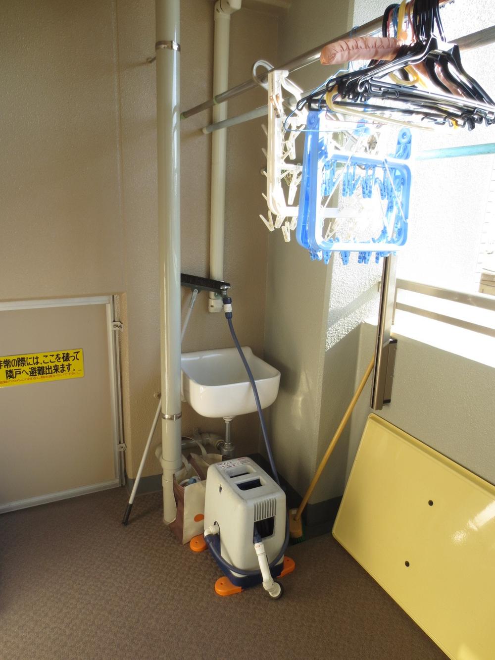 Balcony. Wide balcony of depth 2m, With a convenient slop sink