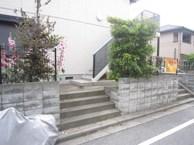 Entrance. Bicycle parking sloped entrance