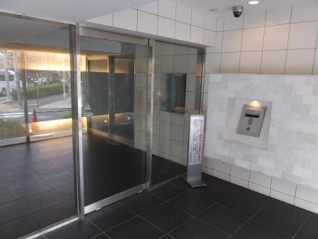 Other local. Using a tile that was the white tones, Bright entrance hall.