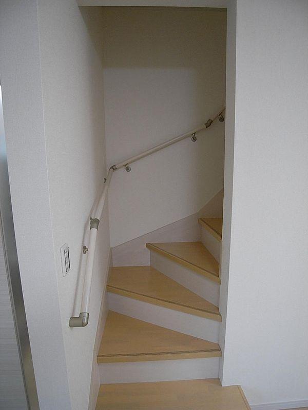 Other. Stairs to the second floor is located in the living room.