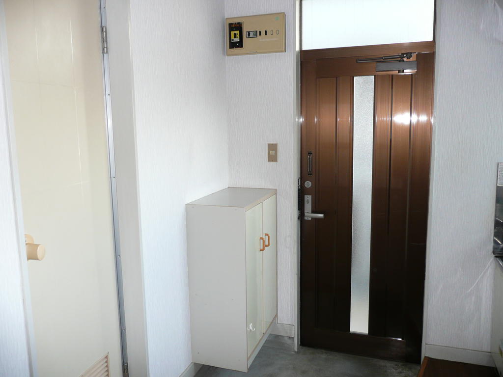 Entrance. With cupboard