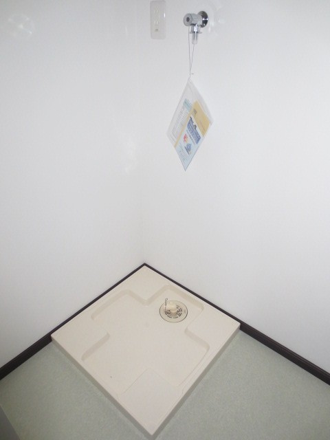 Other Equipment. Washing machine in the room