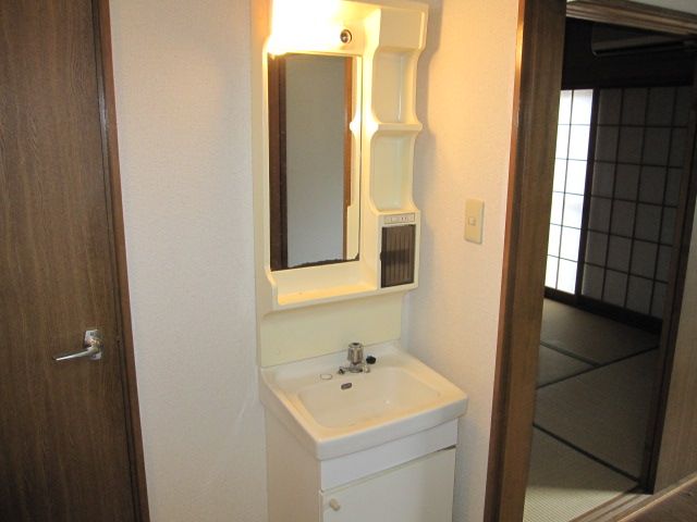 Washroom. Also it comes with a separate wash basin