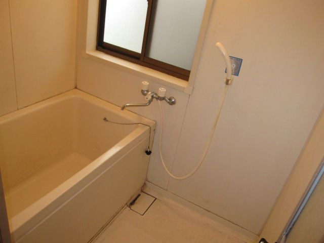 Bath. There is a window in the bath